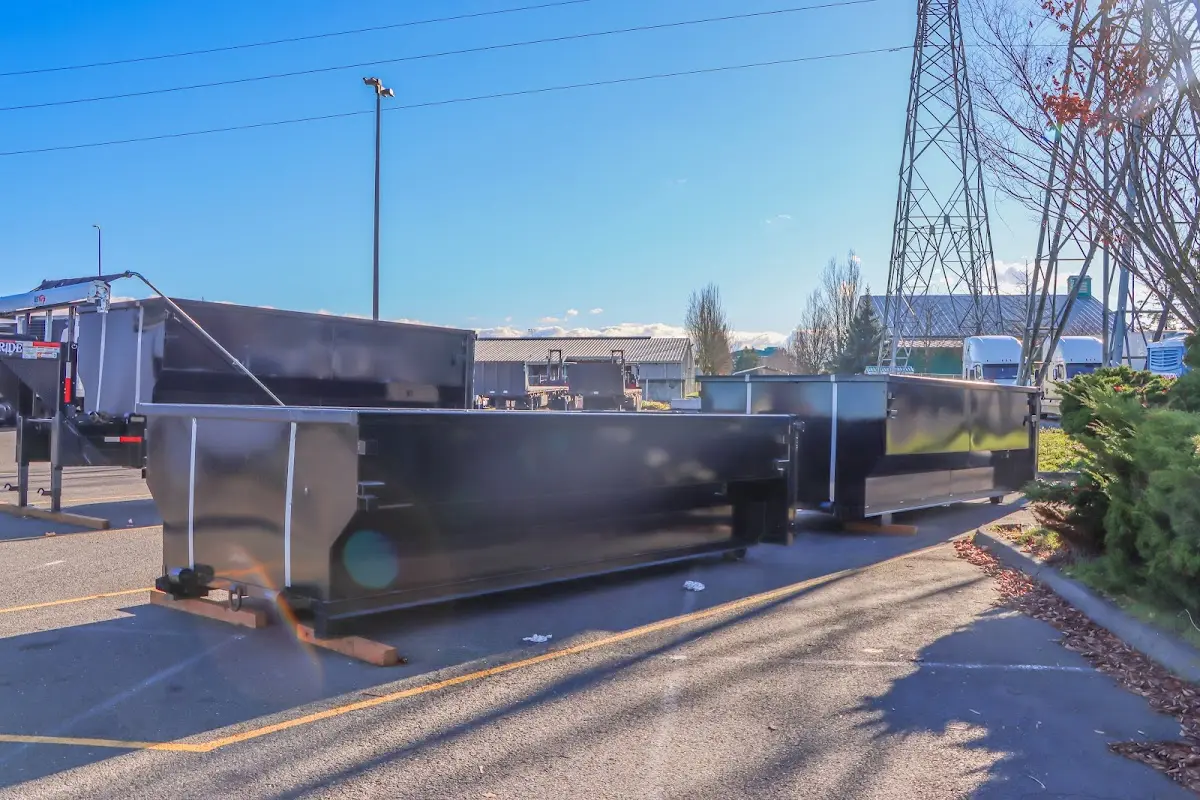 Roll-off dumpster ready for waste disposal at job site for 2 Yard Dumpster Rental in Minooka